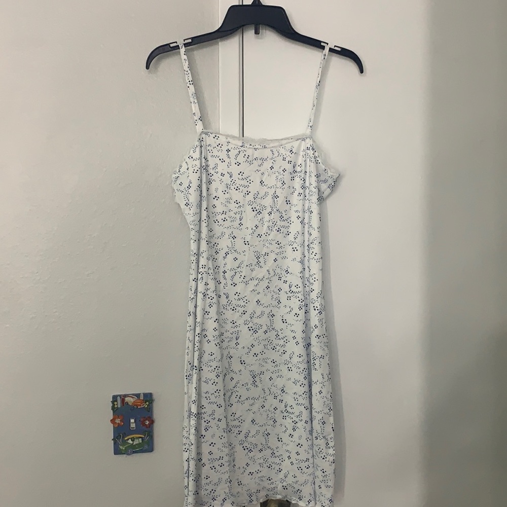 White dress with blue vine design